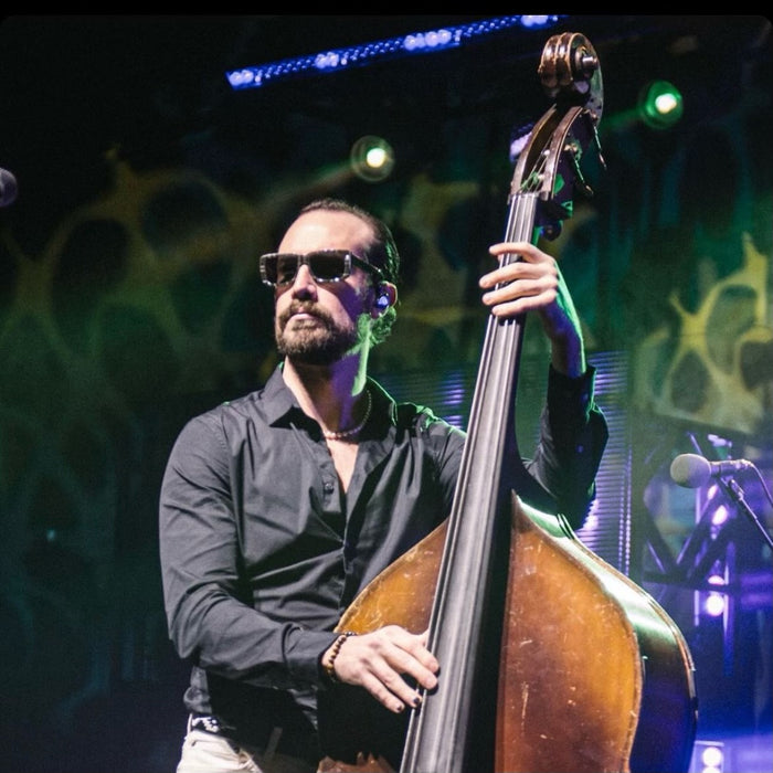 Royal Masat plays the upright bass.