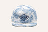 A white and blue Imperial Summer Hat with palm leaves on it by Zilker Belts.